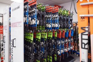 Photo of skis on the big shelf in rental